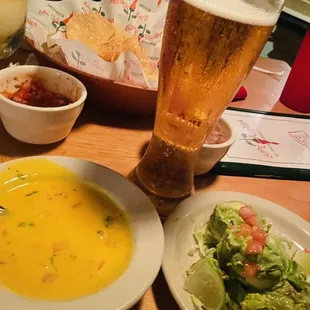 Modelo Especial with queso, salsa, charro beans, and guacamole