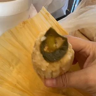 Champurrado and tamal de queso con rajas