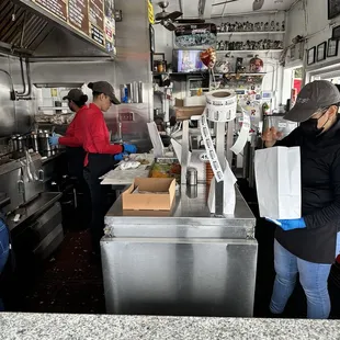 Lupe's making customers orders