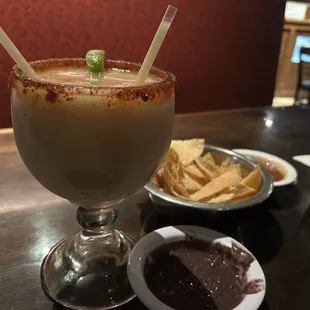 Margarita with chips and complimentary bean dip
