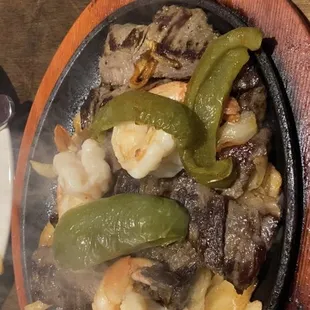 Mix grill fajitas with steak and shrimp. No seasoning and 3 shrimp