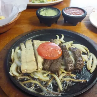 Fajitas are very tasty, a bit on the skimpy side. Same goes for the guacamole that comes with the meal.