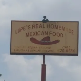 a sign for lupe's real homemade mexican food