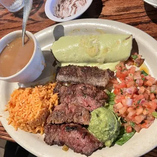 Carna asada tempiqueno (misspelt) with a Shrimp enchilada(substitution)