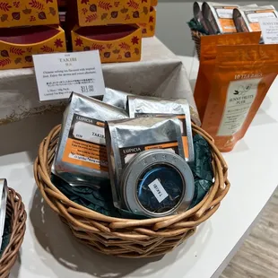 a basket of teas and tea bags