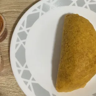 Beef empanada with spicy salsa and ketchup mayo ($2.50)