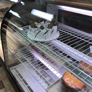 a display of cakes and pastries