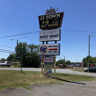 Sign pointing out the adjacent drive through beverage business (appeared closed).