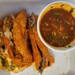 Two Chicken Birria TACOS and one Steak Birria Taco with Consumè