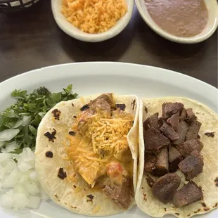 Lengua taco and carne guisada.