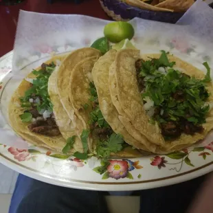 three tacos on a plate