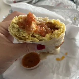 Bacon egg and cheese with their salsa