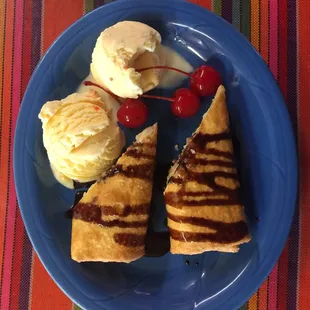 This is called the Monkey "El Chango".   It is a creme cheese delight.  Enjoy with a side of Ice Cream and garnish with Cherries.  Mmmmmmm!