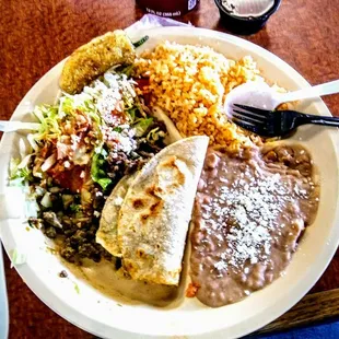 Carne Asada Taco and Enchilada, Beans, and Rice. Delicious!