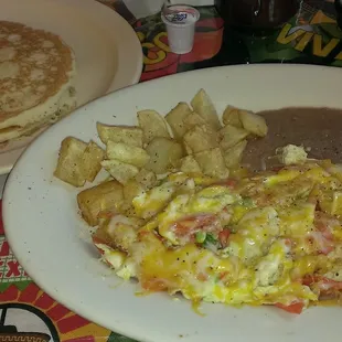 Chilaquiles with eggs plate and pancakes $5.99.