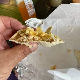 Sorry, this is what was left of a great breakfast bacon, potato, egg and bean burrito.