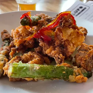 a plate of fried food on a table