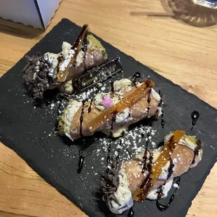 a plate of desserts on a table