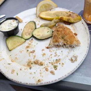 Almost done walleye with grilled zucchini and squash.