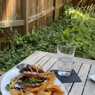 a plate of chips and a glass of water