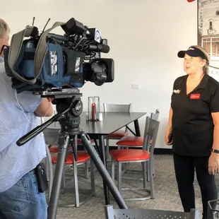 The owner of Lu&apos;s, Elaine Brown being interviewed by fox 8 and channel 5
