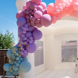 Lush Balloons - Ordered their Basic Balloon Garland with gold butterfly decals and they attached to Utopia Haus bounce house.