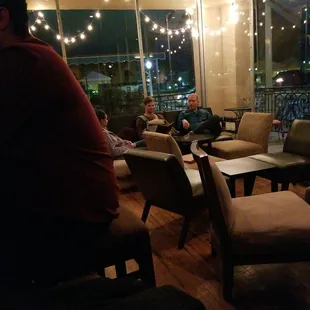 a man sitting in a lounge area