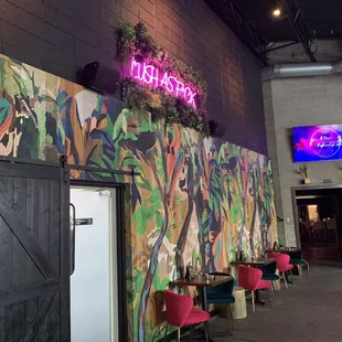 a colorful mural on the wall