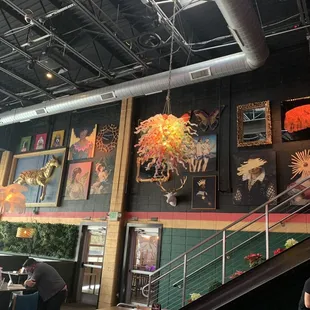 people sitting at tables in a restaurant