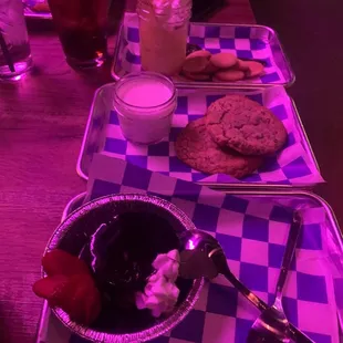 two trays of food on a table