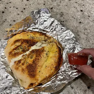 Pepperoni and sausage calzone with Edie Beatty Pepperoni and sausage calzone with very little marinara. ????