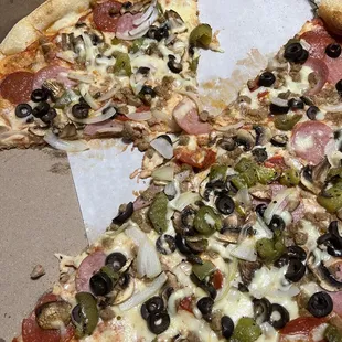 People dug in before I could snap a pic. Lushajs Supreme Pizza