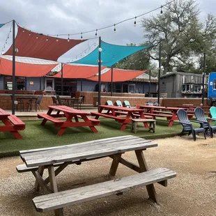 a picnic area with tables and chairs