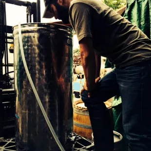 Winemaker David (Lusu Cellars)  working on his wine!