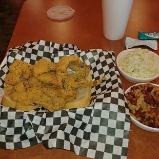 Fried whiting with slaw and red beans and rice.