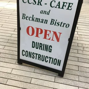 a sign for a cafe