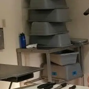 a man in a kitchen preparing food