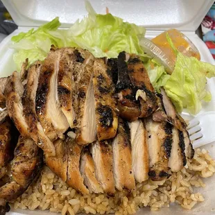 Extra chicken combo with brown rice and no veggies substitute salad... yes its just plain lettuce etc but i love the salad sauce