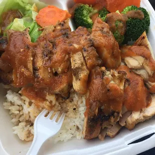 Double chicken bowl with hot sauce! Delicious!