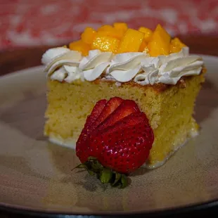 Traditional Tres Leches with fresh mango