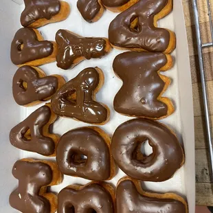 a box of chocolate donuts