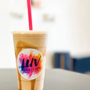 a cold drink in a plastic cup