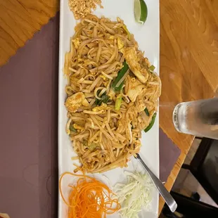 a plate of noodles and vegetables