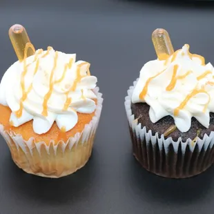 two cupcakes with icing on them