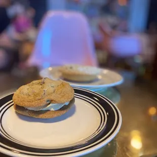 Cookie sandwich with espresso icing, chocolate chip donut