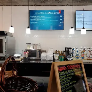 menus on the wall of the restaurant