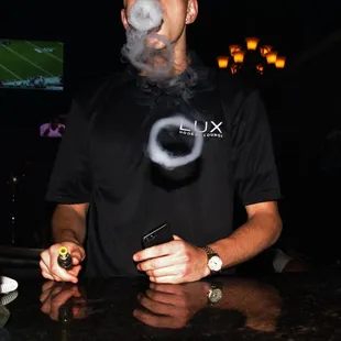 a man smoking a hookah