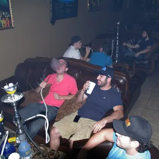 a group of people sitting on a couch