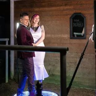 Newlyweds having a blast on our 360 booth!