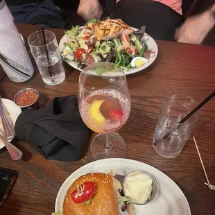 Salmon salad and blue cheese burger